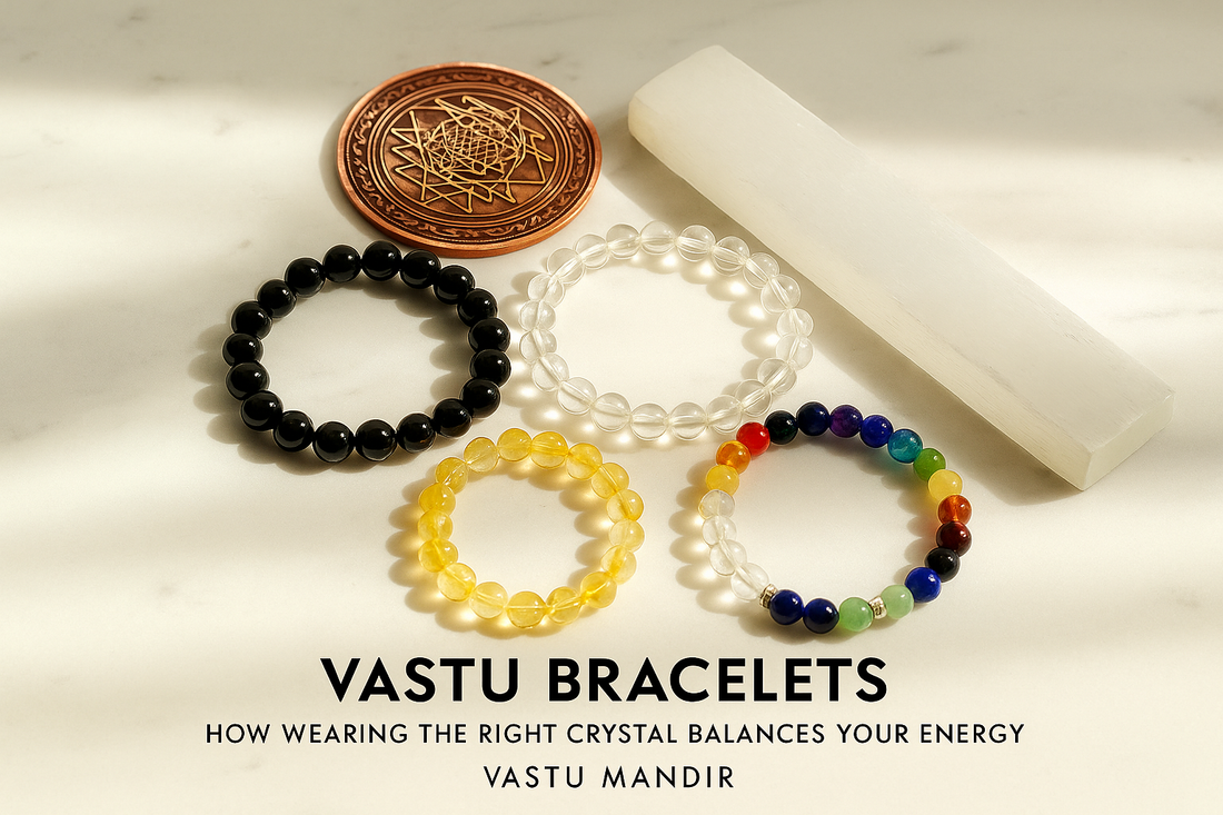 Black tourmaline, citrine, and chakra crystal bracelets beside selenite plate and copper yantra — luxury Vastu Mandir bracelets for energy balance.