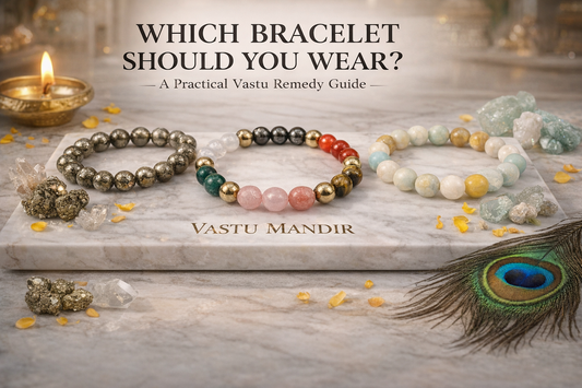 Three distinct bracelets arranged in a structured layout on a marble slab engraved “Vastu Mandir”.