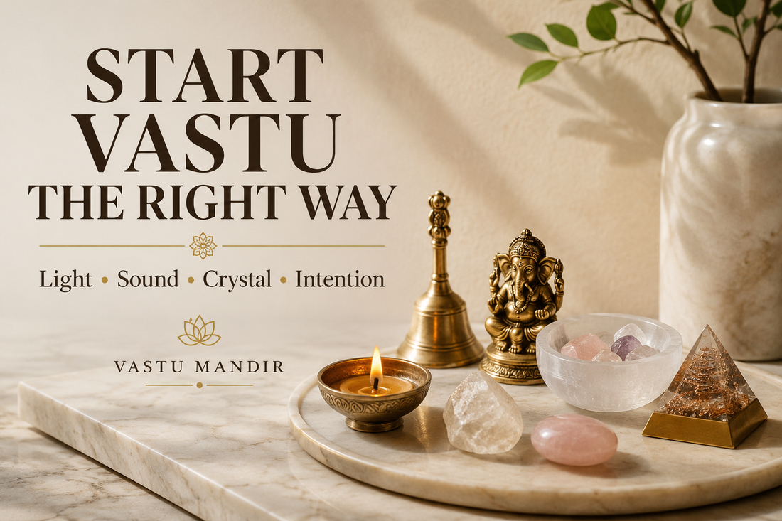 Beginner Vastu setup with diya, brass bell, sacred idol, crystal bowl, raw stone, selenite plate, and pyramid on a luxury marble surface.