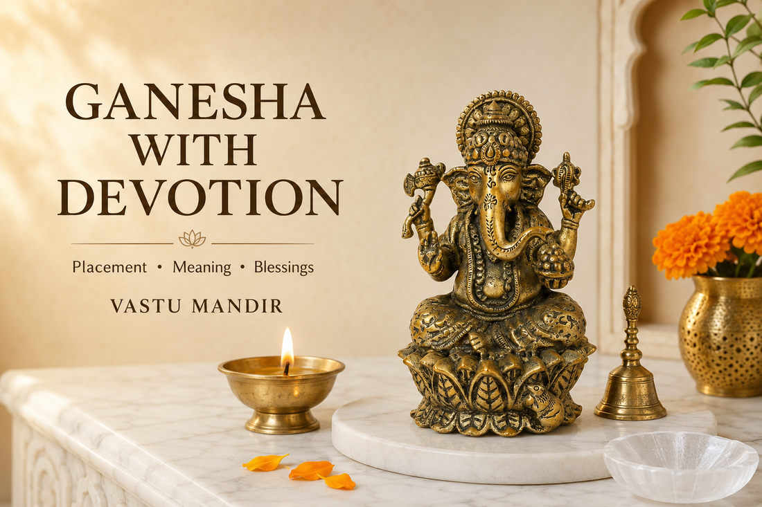 Brass Ganesha idol seated on lotus base with left-turning trunk, diya, bell, flowers, and clean Vastu home mandir.