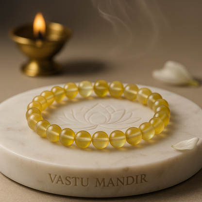 Yellow Aura Quartz 8mm bead bracelet with iridescent golden sheen on elastic.