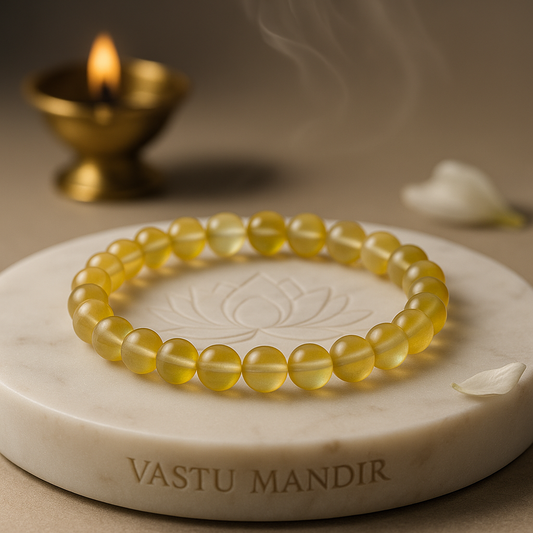 Yellow Aura Quartz 8mm bead bracelet with iridescent golden sheen on elastic.