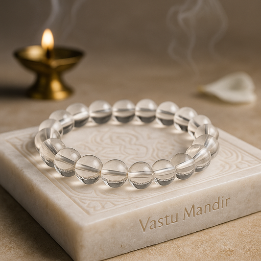 Hydro Quartz 8mm bead bracelet on a marble surface with 'Vastu Mandir' branding, candle in the background