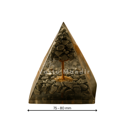 Triangular decorative item with stones and a tree on a white background