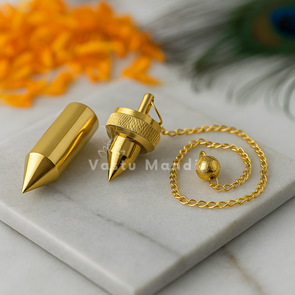 Pure Brass Dowsing Pendulum Pointed Cone Shape Metal Chain Vastu Remedy Verification Tool on a marble surface