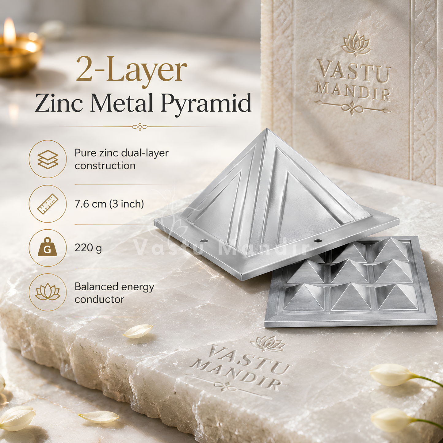 Two-layer zinc metal pyramid mold set displayed on a marble surface with decorative flower petals and a branded box. Text highlights pure zinc dual-layer construction, 7.