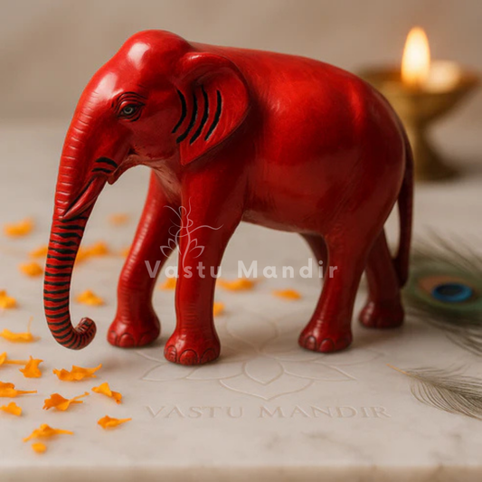 Red Elephant 100% Pure Brass Statue on a surface with 'Vastu Mandir' branding.