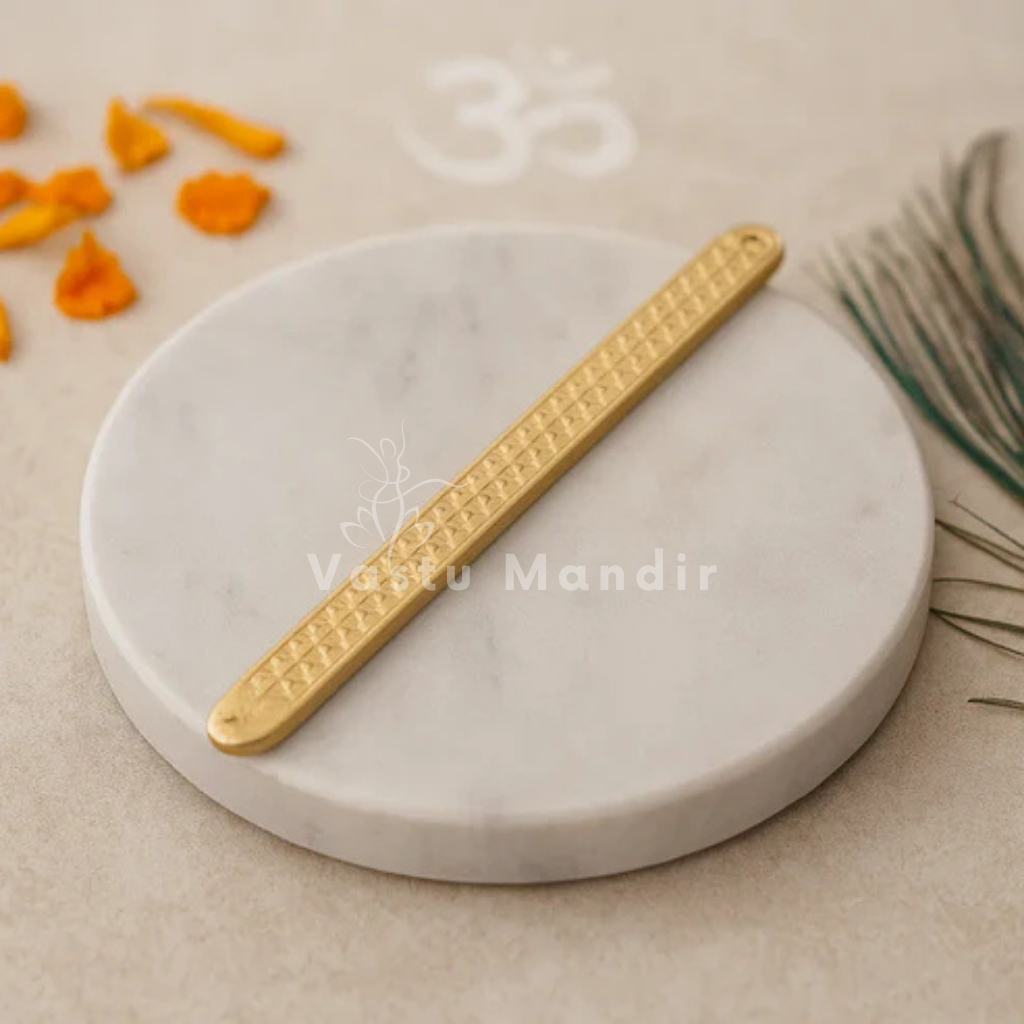 Pyramid Strip 10.5 inches for Vastu Remedy in Brass on a marble surface with 'Vastu Mandir' branding.