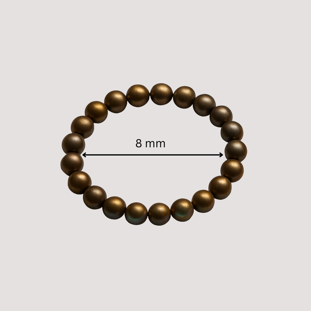 natural pyrite stretch bracelet with a measurement label indicating 8 mm diameter on a light gray background