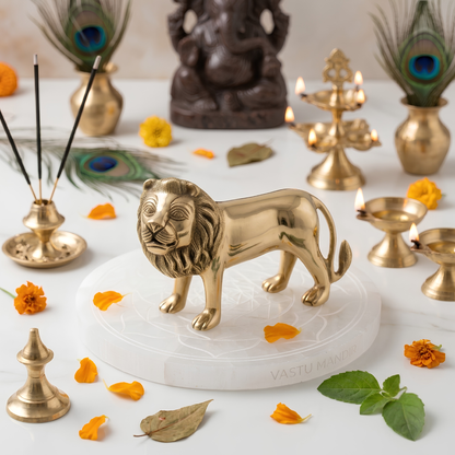 Large brass lion idol alternate side angle on a white marble platform
