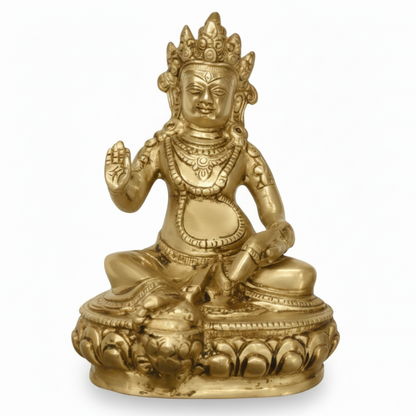 Gold-colored statue of a seated figure on a white background