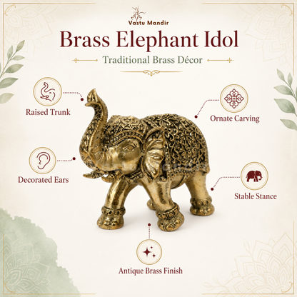 Brass elephant idol with decorative features on a beige background