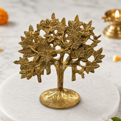 Brass Kalpavriksha tree front view on a sacred white pedestal with floral accents