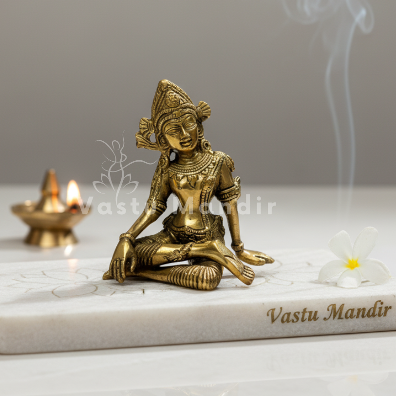 Indra Dev 100% Pure Brass Statue Idol on a marble base with 'Vastu Mandir' branding, surrounded by smoke and a lit candle.