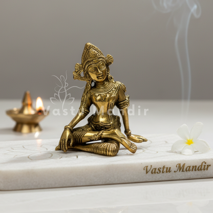Indra Dev 100% Pure Brass Statue Idol on a marble base with 'Vastu Mandir' branding, surrounded by smoke and a lit candle.