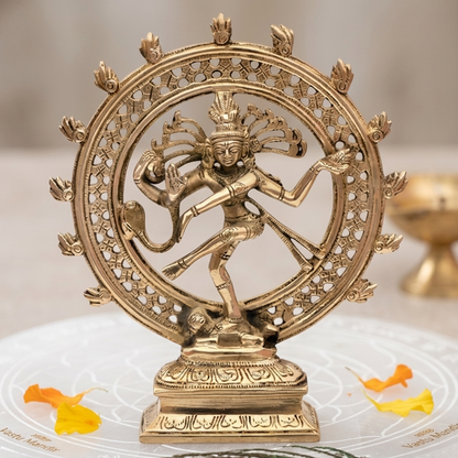 Brass Nataraja Idol on a white surface