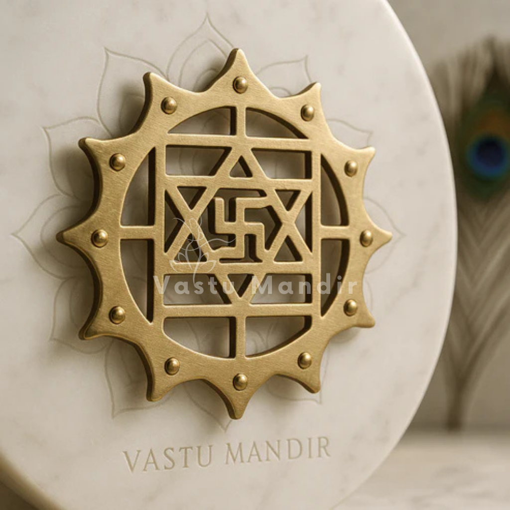 Brass Swastik (Kamal Satya) with 12 rays design on a white background, branded 'Vastu Mandir'.