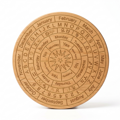 Wooden circular calendar with engraved text on a white background