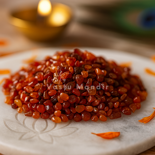 Marble plate with red Carnelian crystals on a blurred background