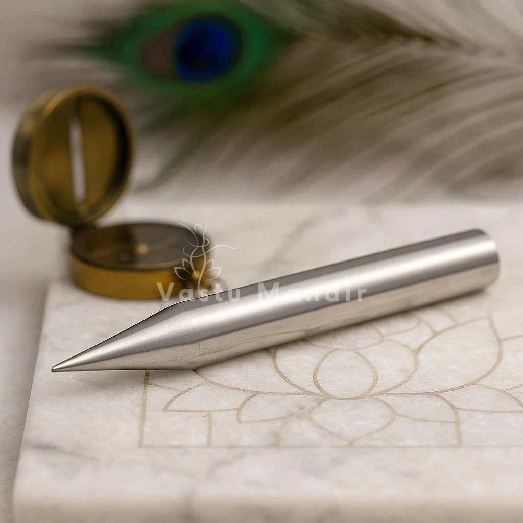 Iron Kilak Rods on a marble surface with a peacock feather in the background