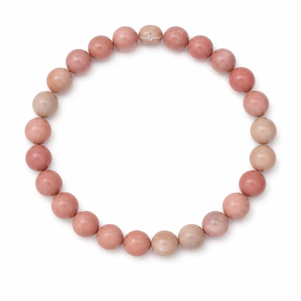Natural Rhodochrosite Crystal Bracelet on a white background