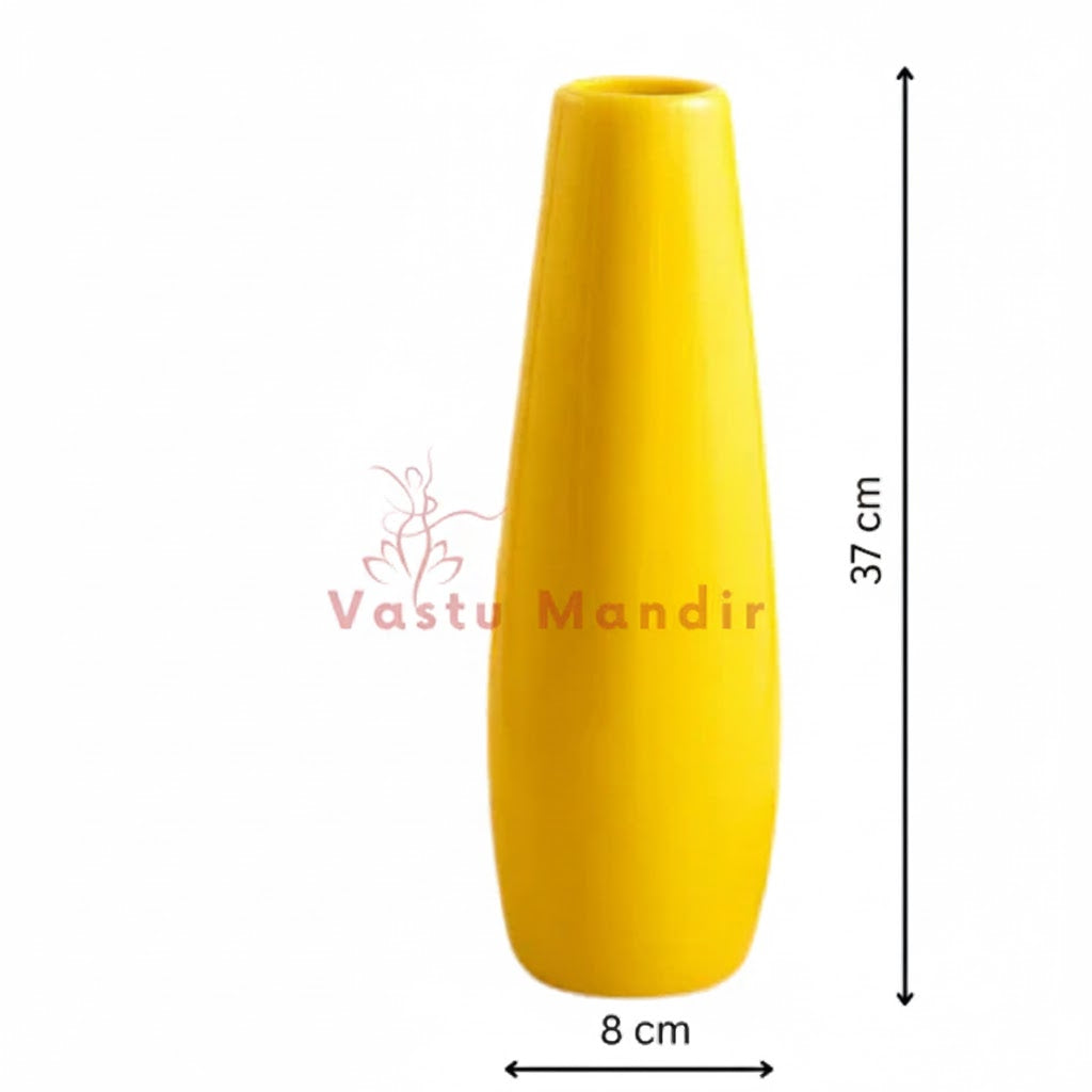 Yellow vase with dimensions on a white background, branded 'Vastu Mandir'.