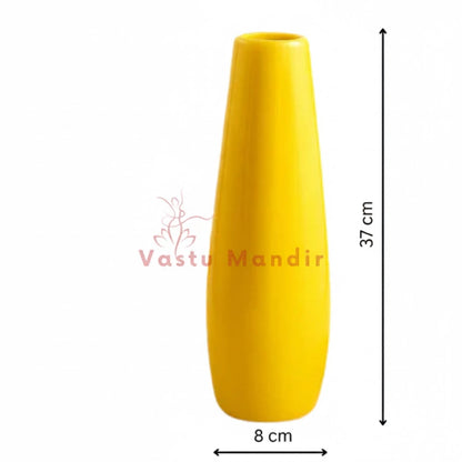 Yellow vase with dimensions on a white background, branded 'Vastu Mandir'.
