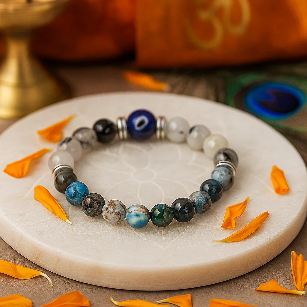Gemini zodiac crystal bracelet 8mm beads on a marble surface with orange petals
