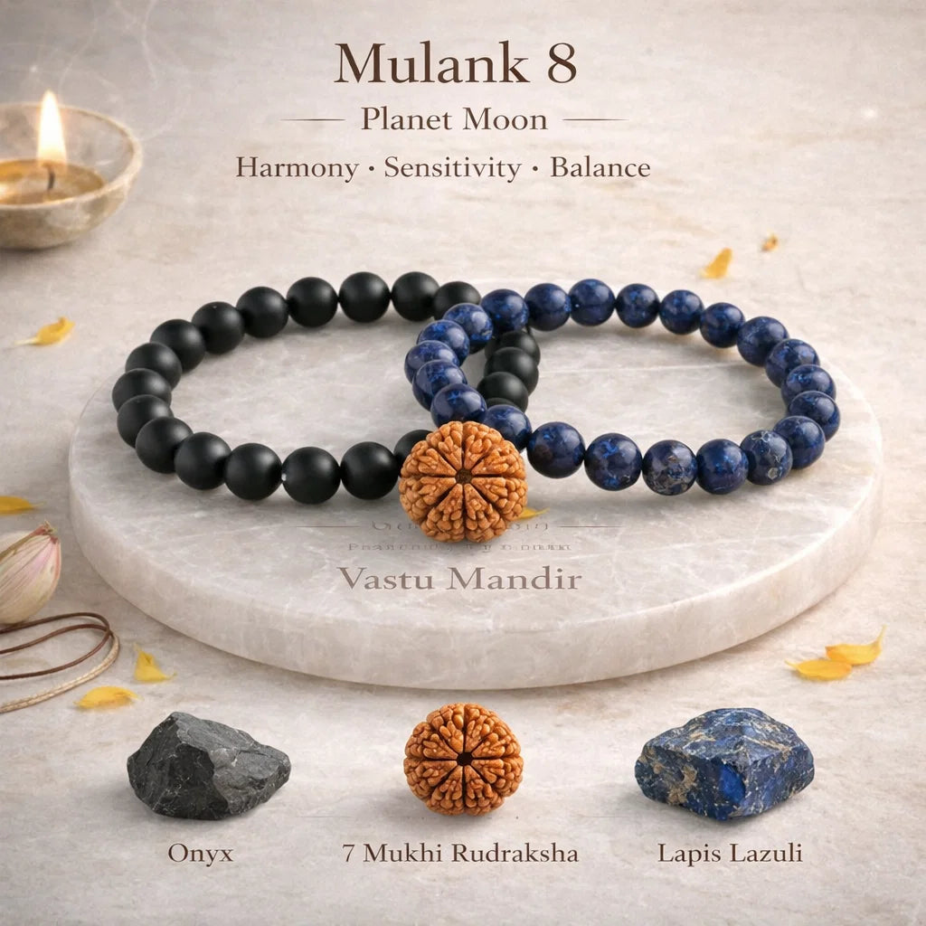 Two beaded bracelets on a marble surface with stones and candles, featuring 'Mulank 8' and 'Vastu Mandir' text.